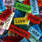 LOVE Word Cloud printed on colorful paper different languages